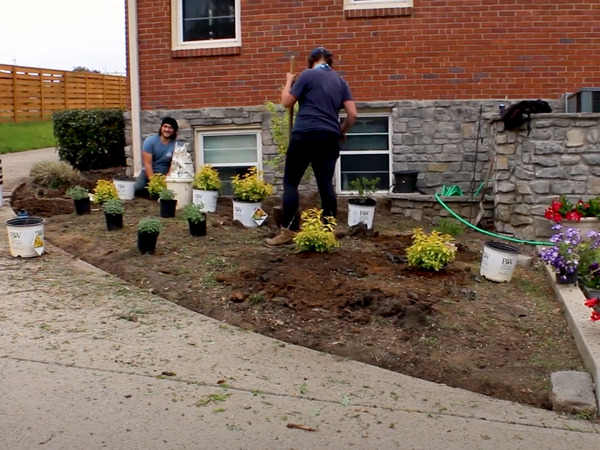 The JVI crew on a Nashville job site, prepping plants for a fresh landscape install.